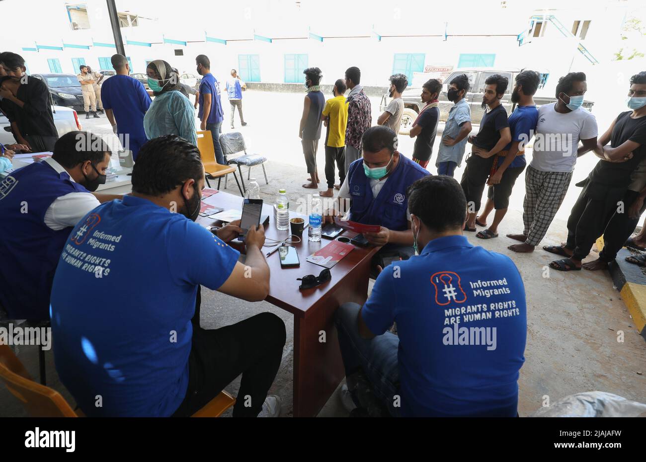 Tripoli, Libya. 30th May, 2022. Employees register illegal migrants' information for COVID-19 vaccination at the Airport Road Shelter Center in Tripoli, Libya, on May 30, 2022. Credit: Hamza Turkia/Xinhua/Alamy Live News Stock Photo