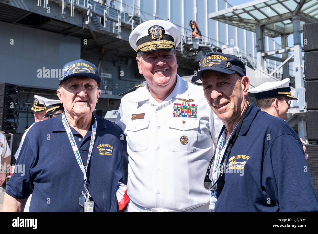 New York, NY May 30, 2022 Rear Admiral Charles Rock (C) poses with former Intrepid crew