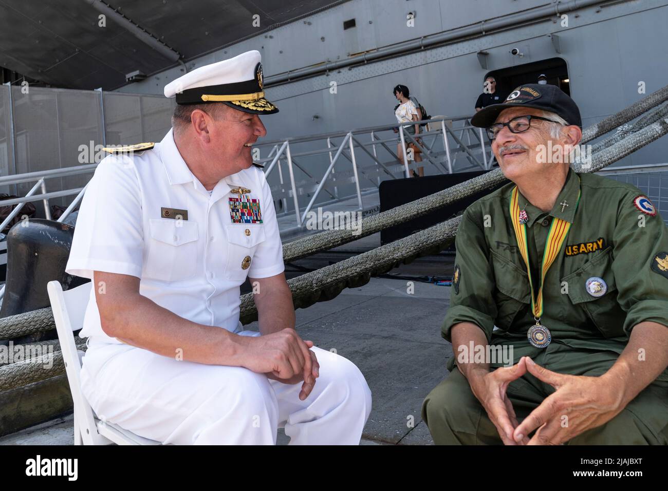 New York, NY May 30, 2022 Rear Admiral Charles Rock speaks with army veteran John Fackre
