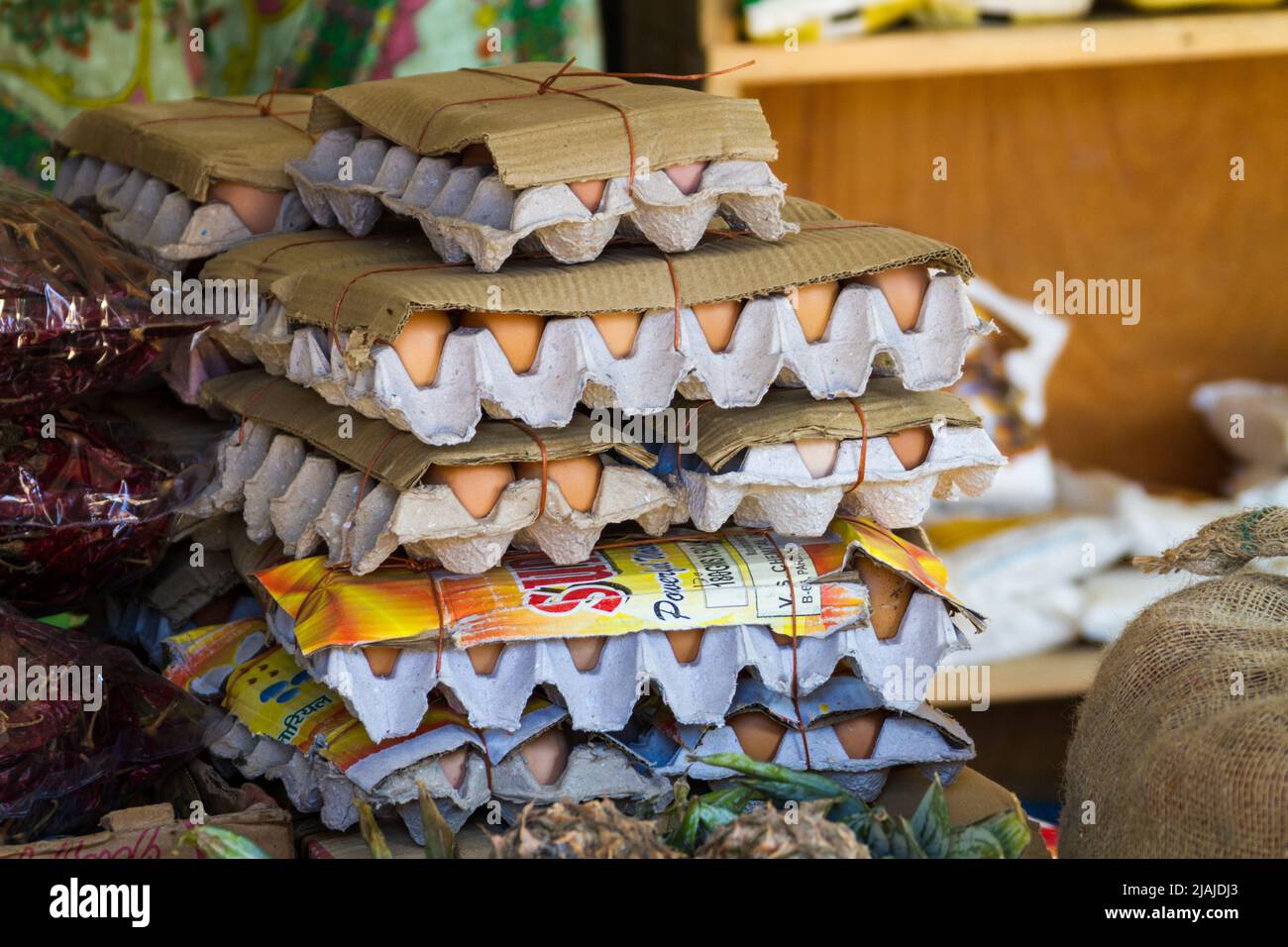 Curtains up on cartons of eggs stacked high - Bumthang - Ura Highway, Jakar, Bumthang, Bhutan (BT) Stock Photo