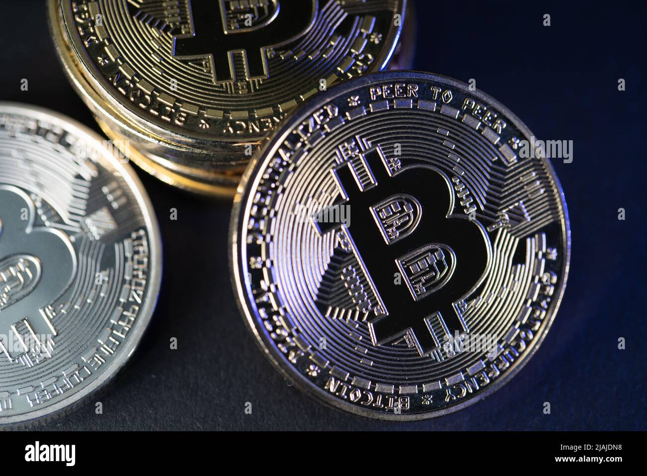 Gold and Silver Bitcoin coins on dark background Stock Photo