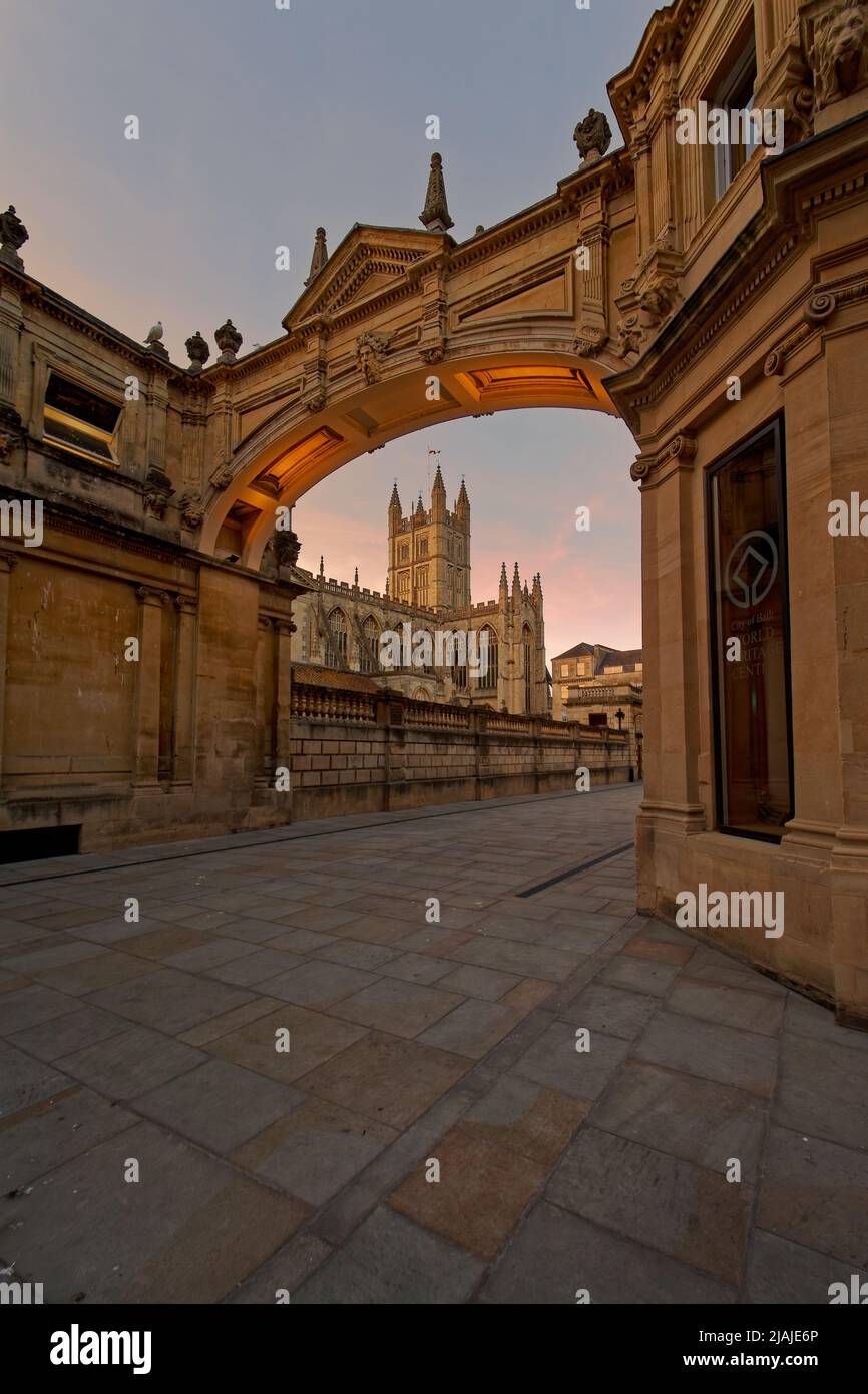 Building arch at York Street framing Bath Abbey new pavement Stock