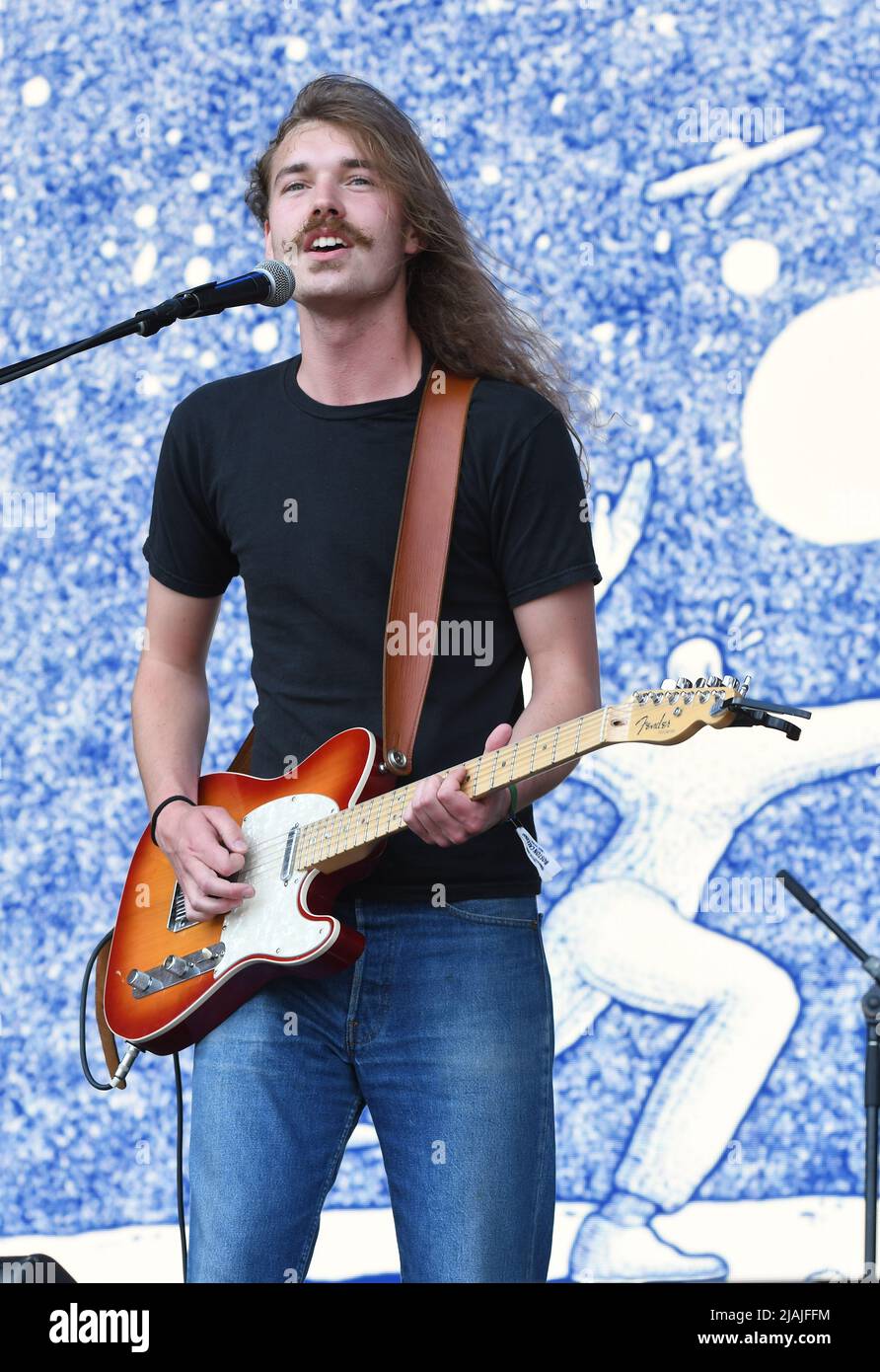 Singer, songwriter and guitarist Joshua Harmon is shown performing on