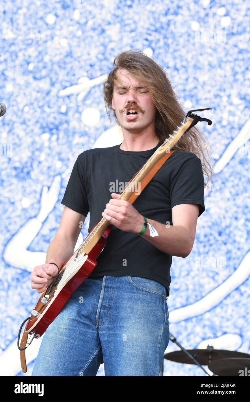Singer, songwriter and guitarist Joshua Harmon is shown performing on