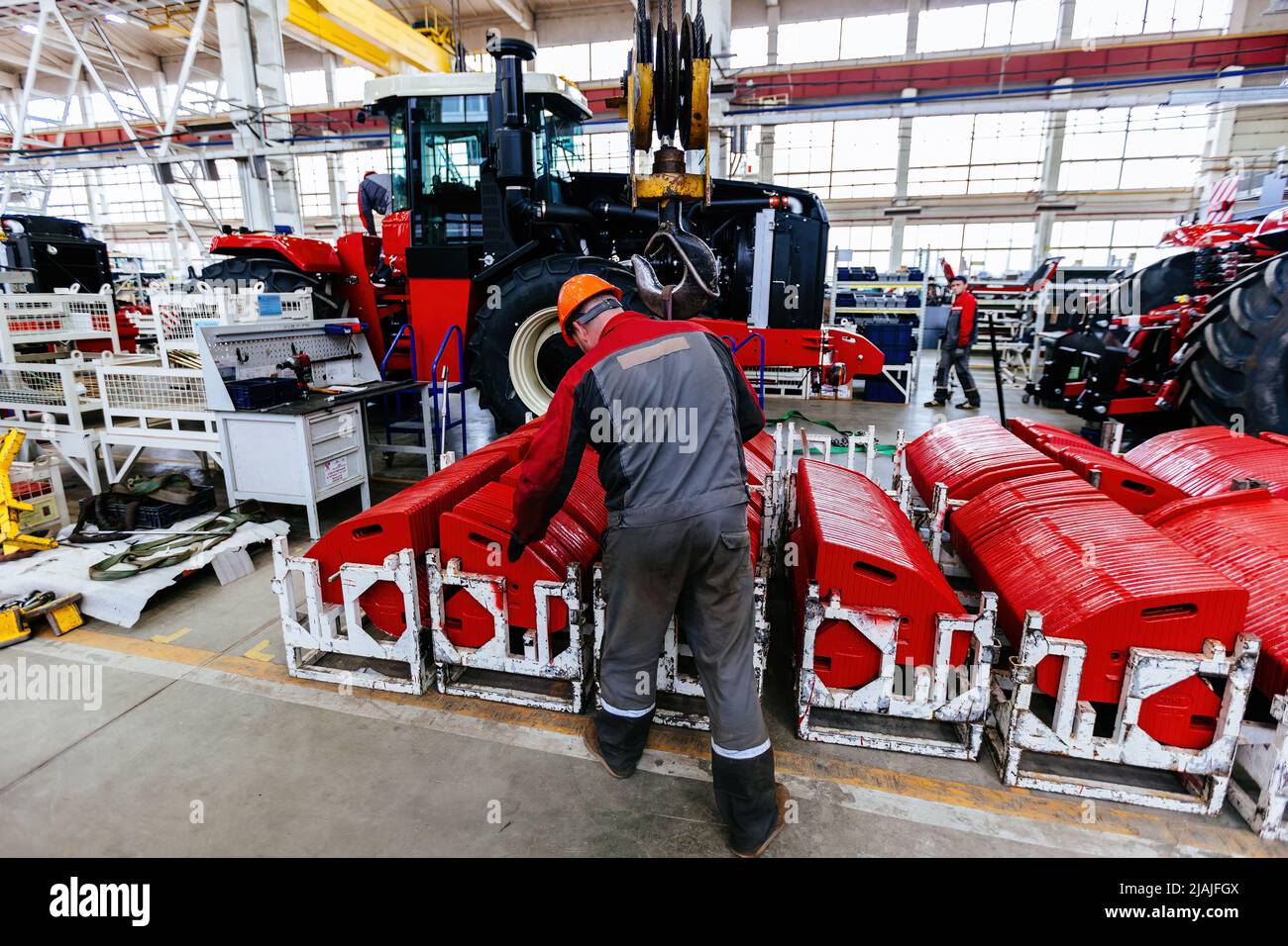 Assembly Design Tractor The process of assembling agricultural tractors and harvesters Stock ...