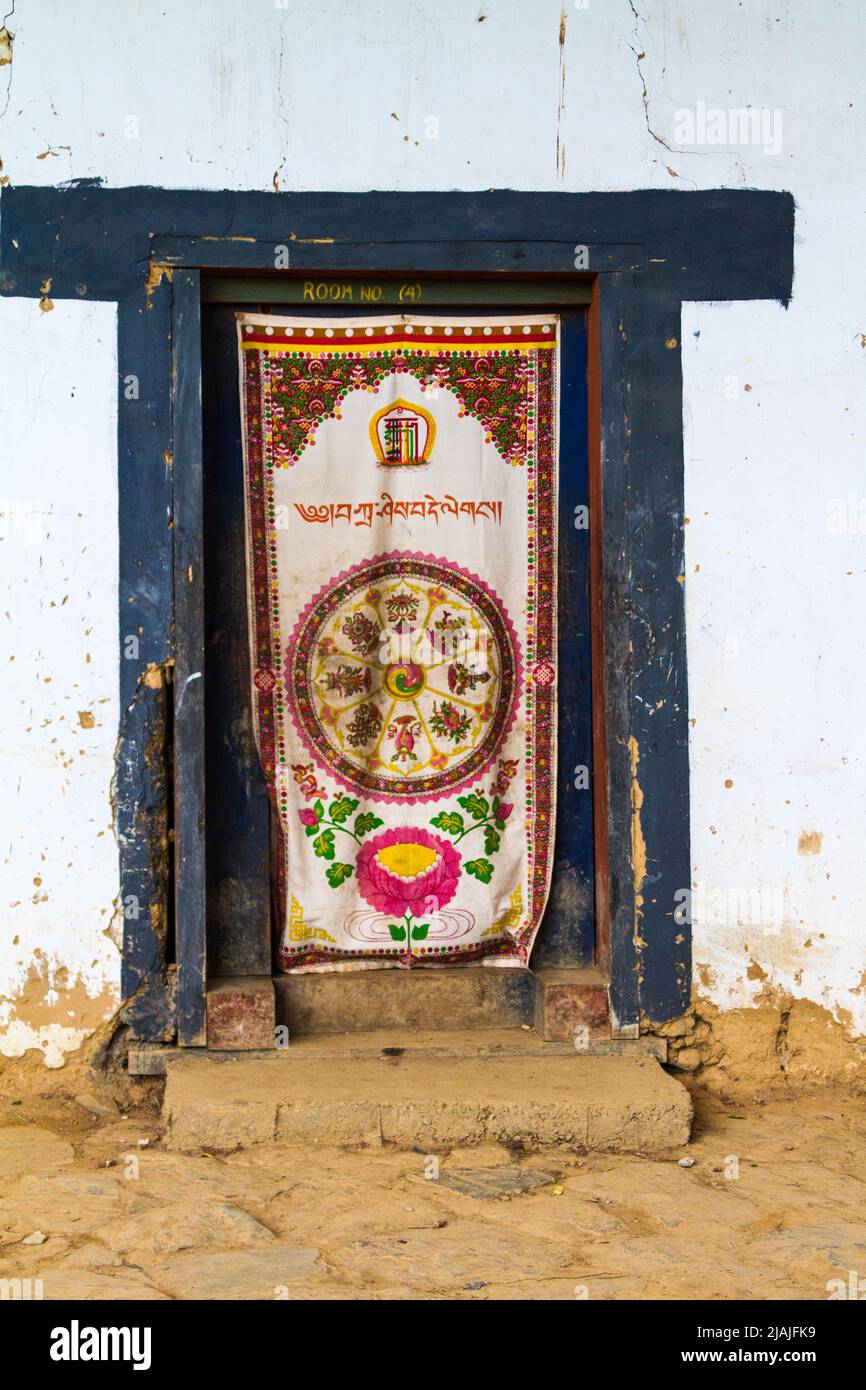 Traditional Tibetan Buddhist Door Covering, Gangteng Monastery, Phobjika Valley,  Wangdue Phodrang District, Bhutan Stock Photo