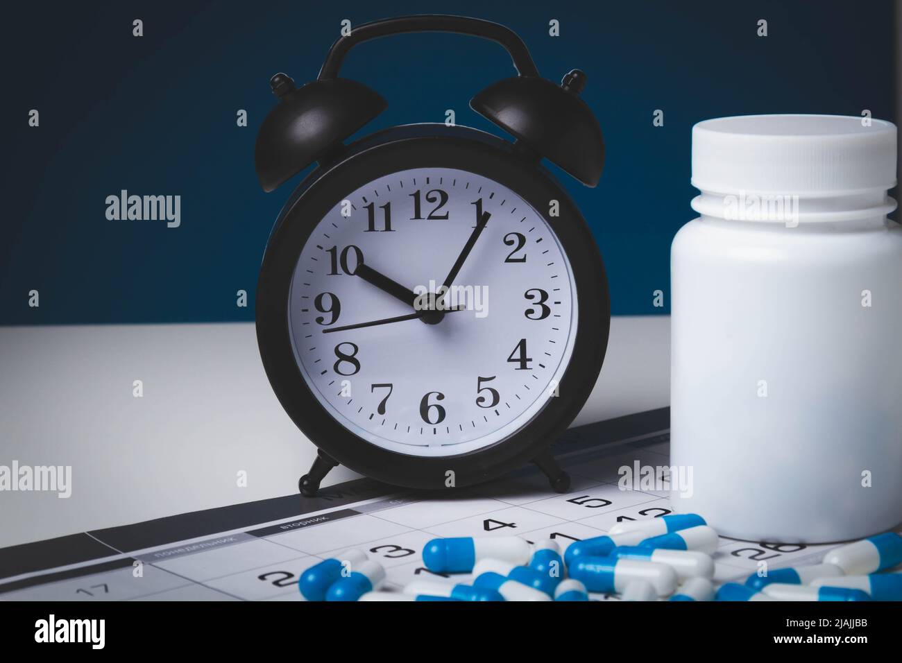 Prevention Clock Time to take your medicine. Pill reminder. Tablets and alarm clock ...