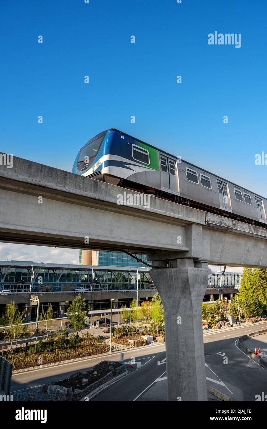 The Canada Line transit train rolls into the International terminal at Vancouver International Airport, or YVR.  Vancouver BC, Canada. Stock Photo