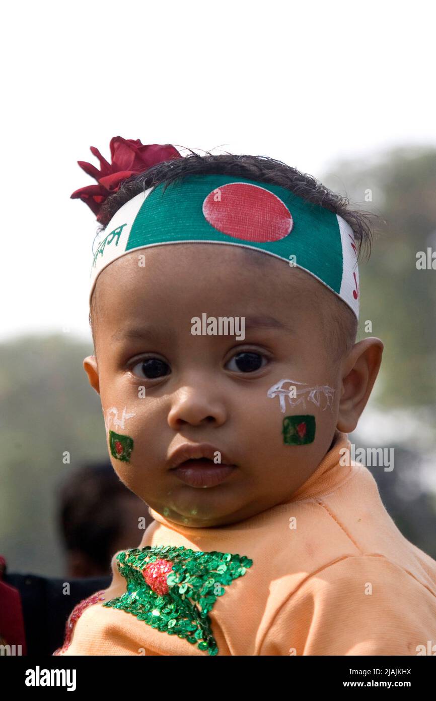 Portrait of an infant at the Bijoy Dibosh (Victory day) 2007 rally at Kendrio Shahid Minar (Monument for the Martyrs of Language Movement) in Dhaka, Bangladesh. On December 16, 1971 Bangladesh earned Independence from the Governing West Pakistan after a nine month long battle. Bangladesh. December 16, 2007. Stock Photo