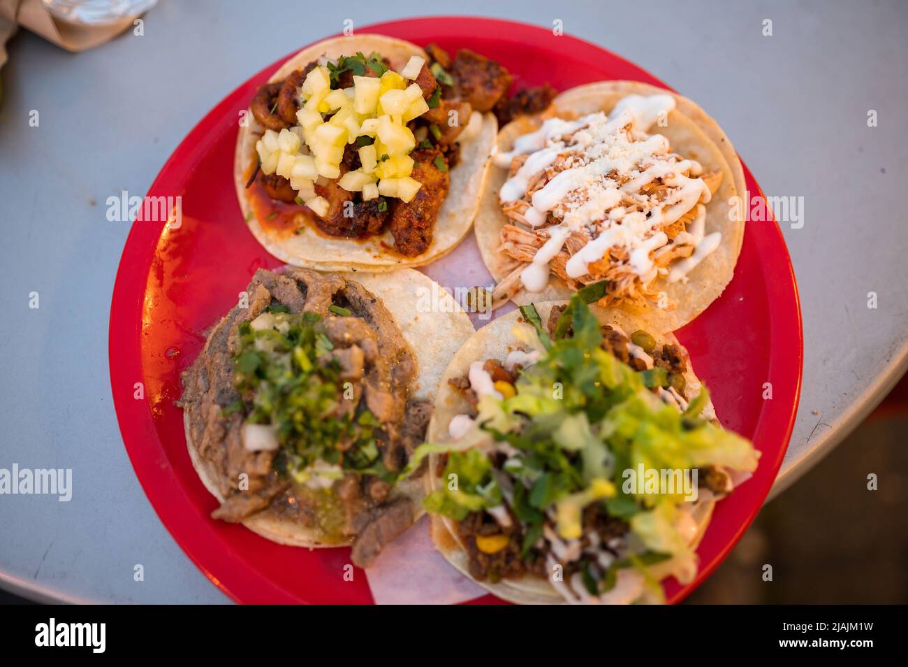 Mexican tacos served at an on-street outdoor dining area in VancouverÕs West End neighbourhood at night.  Vancouver BC, Canada. Stock Photo