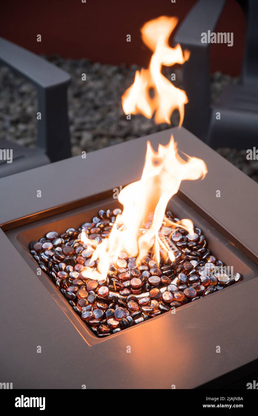An outdoor gas fireplace. Stock Photo