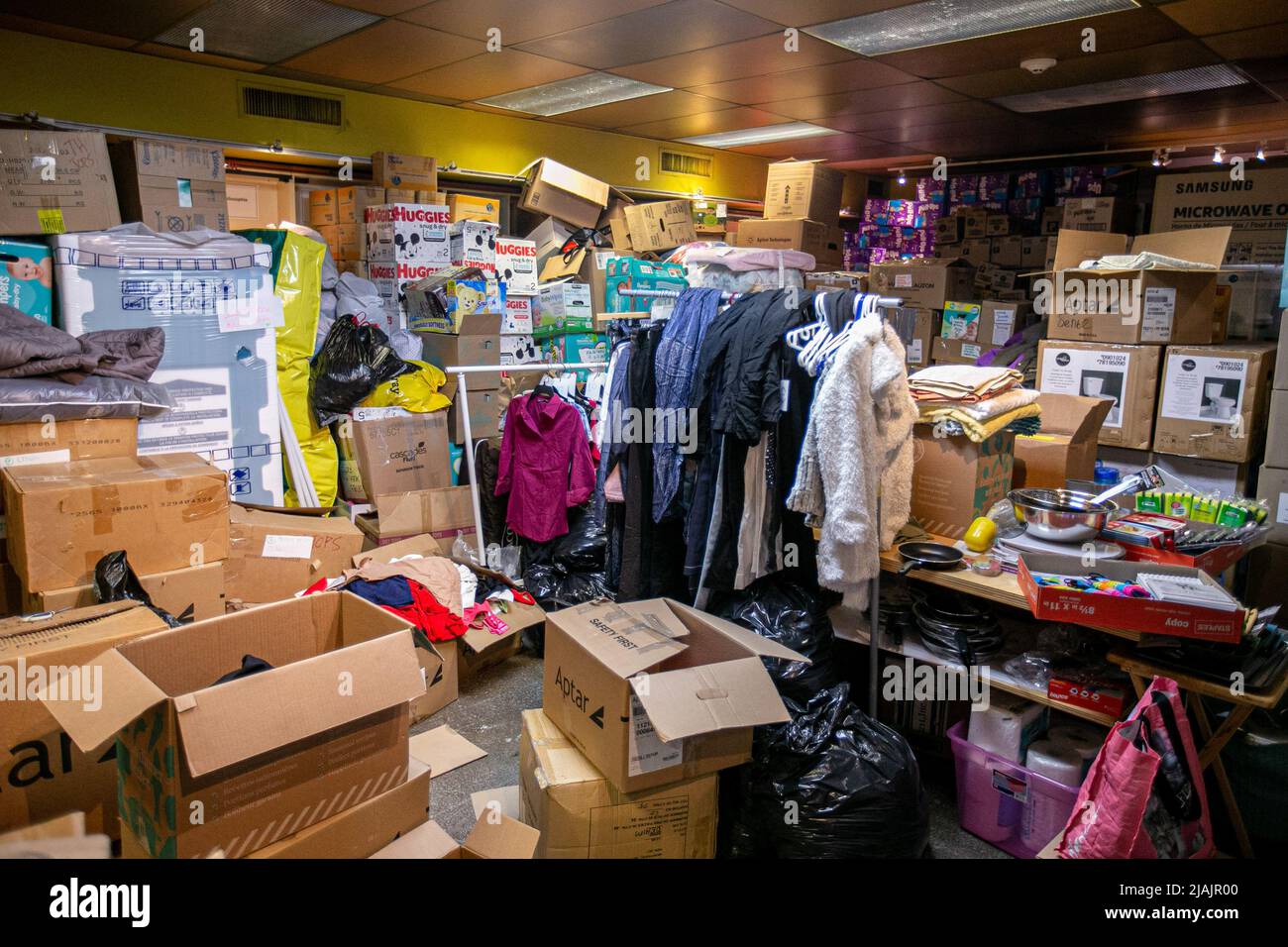 Donations pile up in the Ukrainian Reception Refugee Centre's basement
