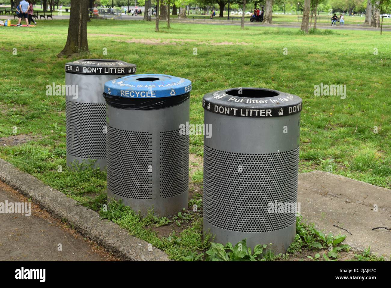 Queens, New York, USA - May 14, 2022 -Metal Garbage and Recycle Bins in the Flushing Meadows Corona Park, Queens, New York. Stock Photo