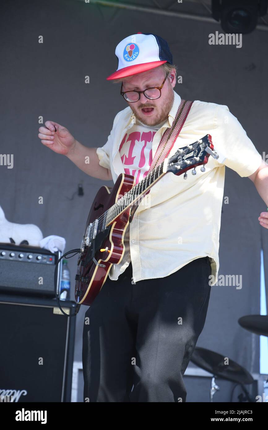 Lead guitarist Bjarki Gudmundsson is shown performing on stage during a