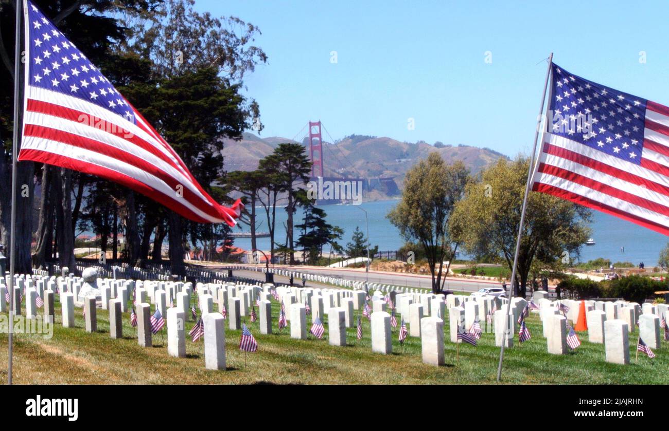 graves flags flying at san francisco presido military cemetary on memorial day 2022 california usa Stock Photo