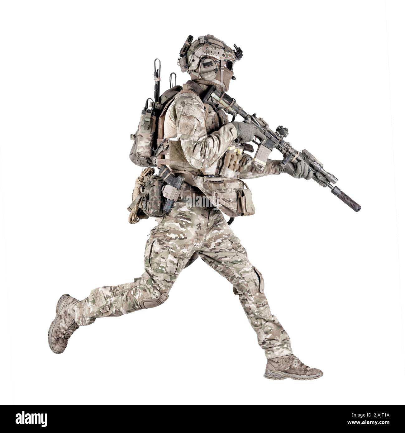 Army soldier in camouflage battle uniform, running with assault rifle