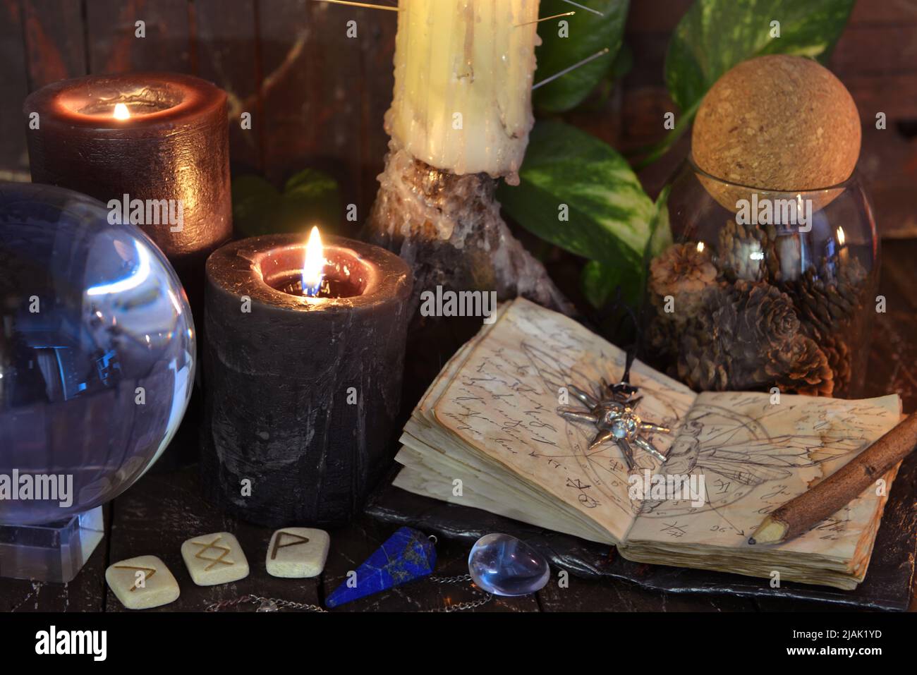 Wicca, esoteric and occult still life with vintage magic objects on