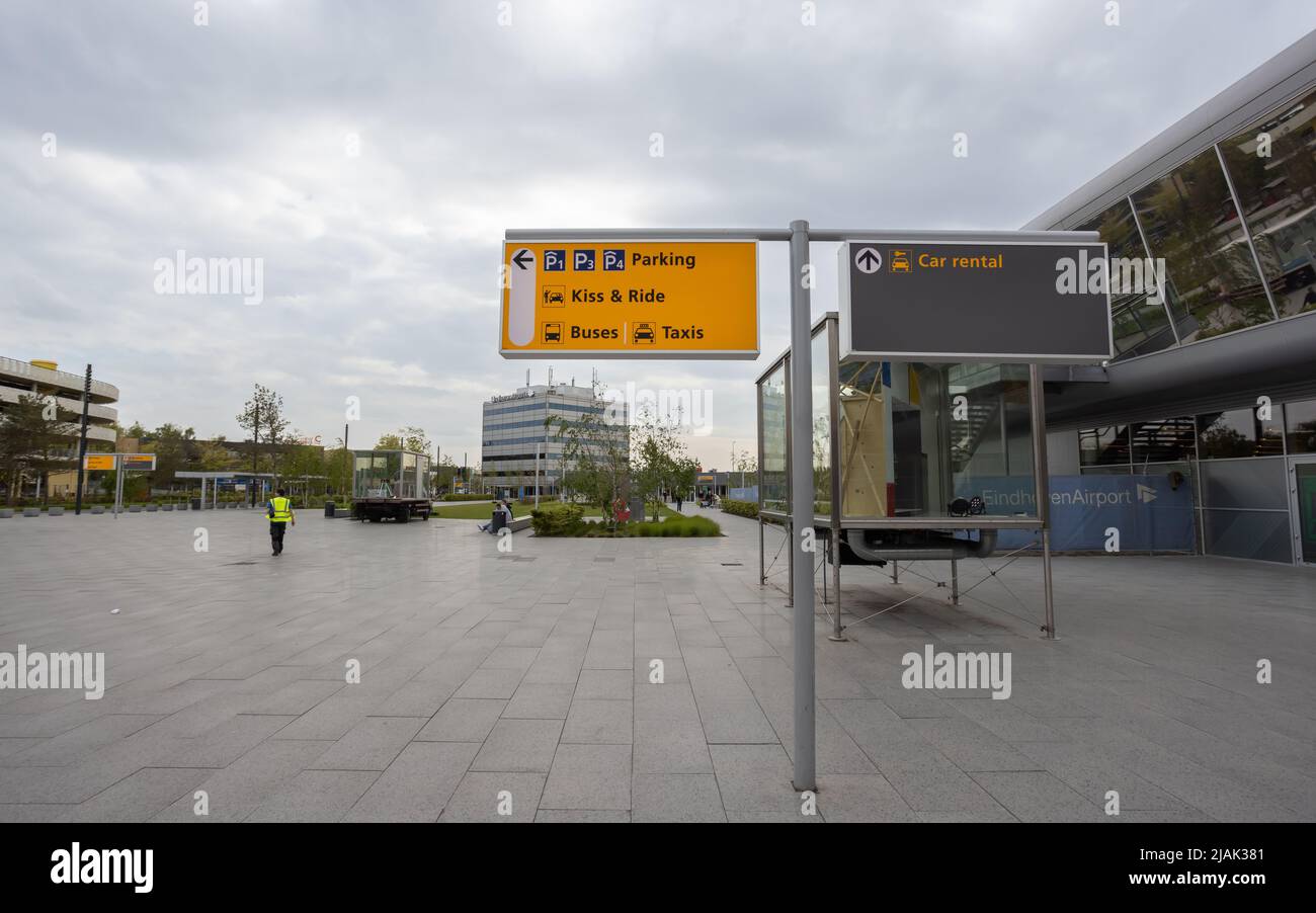 Parking, kiss and ride and car rental signage on a post at Eindhoven International airport Stock Photo