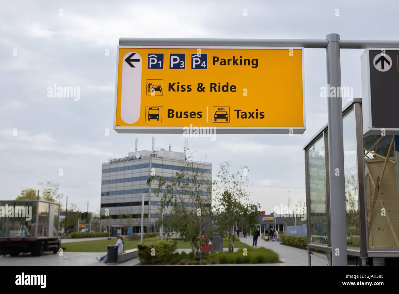 Parking, kiss and ride and taxi signage on a post at Eindhoven International airport Stock Photo