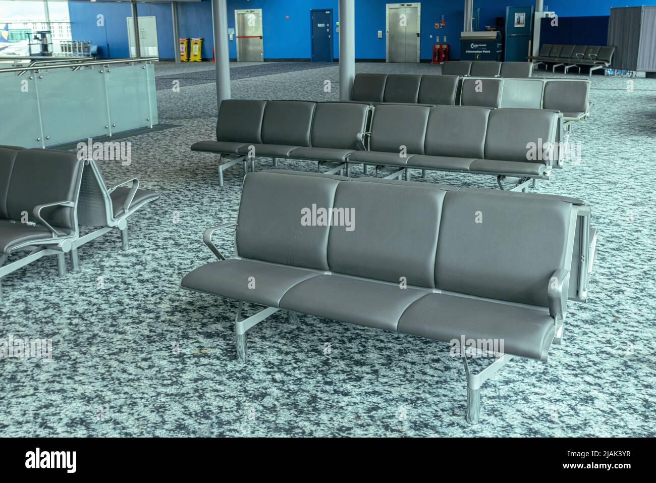Empty seats at London Stansted airport in the waiting area before boarding Stock Photo