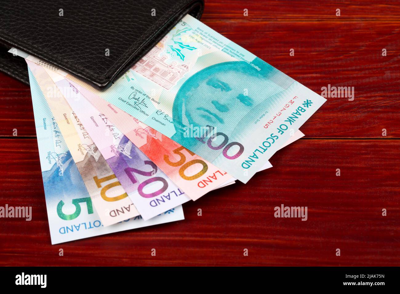 Scottish money - Pounds in the black wallet Stock Photo