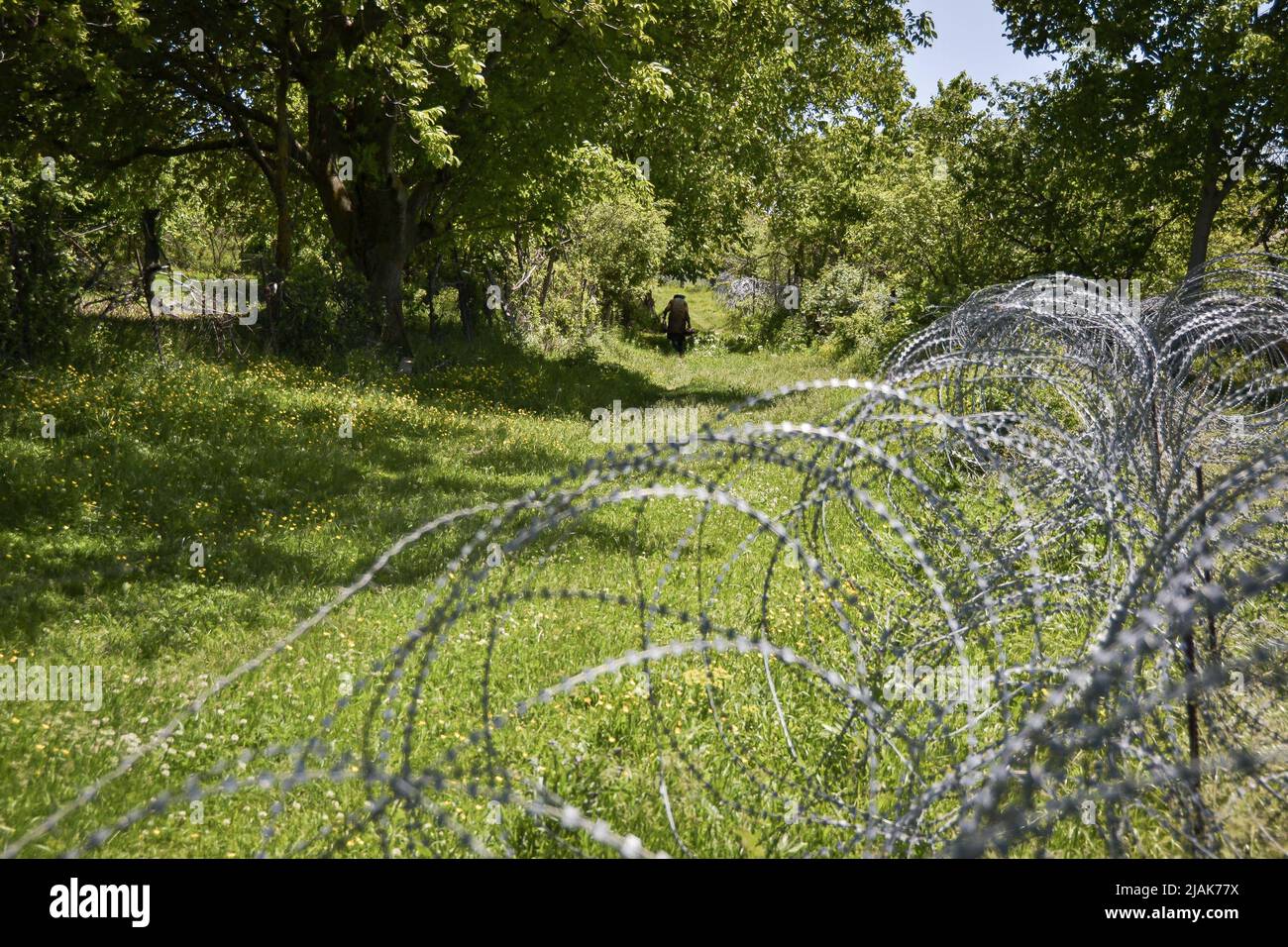 Khurvaleti, Georgia. 28th May, 2022. Barbed wire fence seen from Georgian controlled territory. Since 2008 when Russia invaded Georgia's, South Ossetia's region, Russian border guards installed wire barbed fences. The region is recognized as De Facto state. Leader of South Ossetia, occupied Georgian region, calls for referendum to join Russia. (Credit Image: © Nicolo Vincenzo Malvestuto/SOPA Images via ZUMA Press Wire) Stock Photo