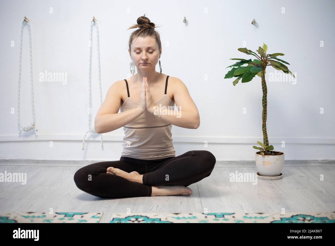 girl training in yoga studio. Healthy and fly Yoga Concept. happy