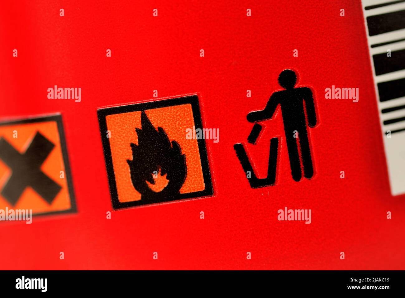 Close-up of packaging with hazard warning label for flammable substance Stock Photo