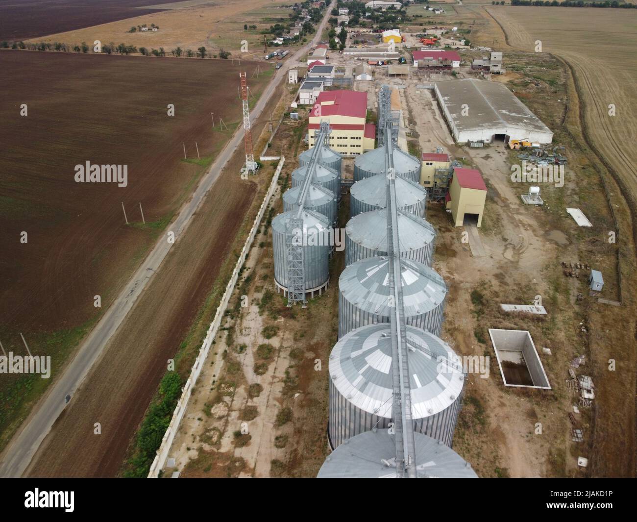 Grain elevator. Metal grain elevator in agricultural zone. Agriculture