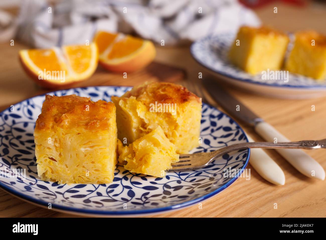 traditional greek orange pie on beautiful plates - Portokalopita Stock ...