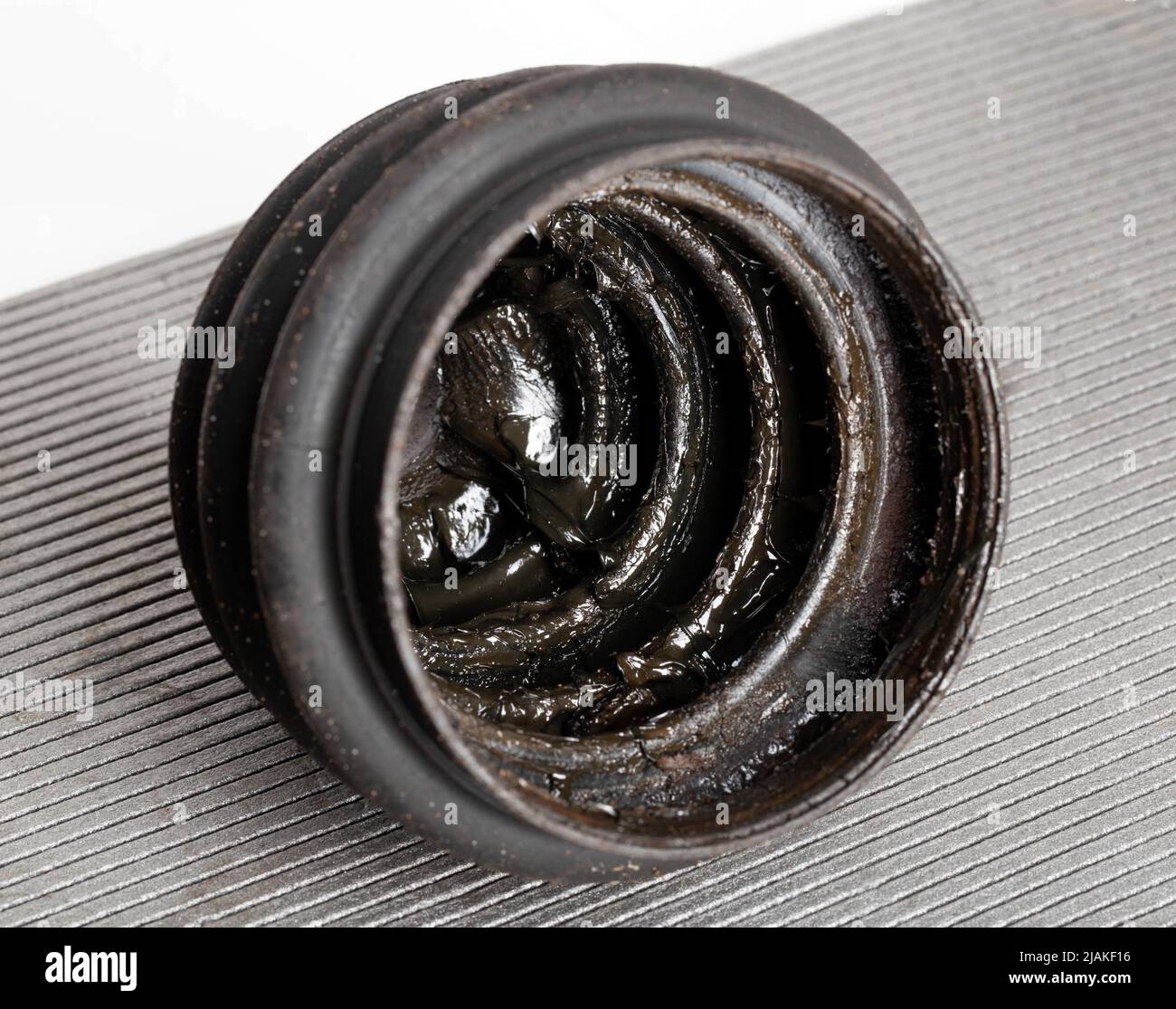 Old CV joint boot providing protection and dirt ingress into the