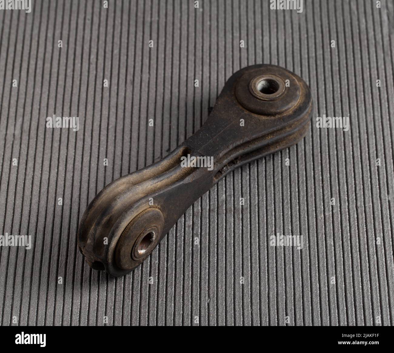 Spare part from car suspension, stabilizer link Stock Photo - Alamy