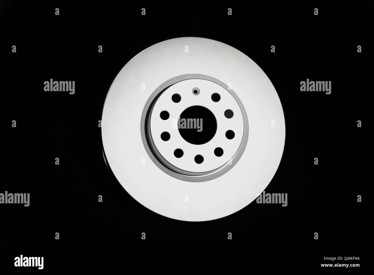 Car brake discs on a black background, isolate. Disc brake system, effective braking Stock Photo
