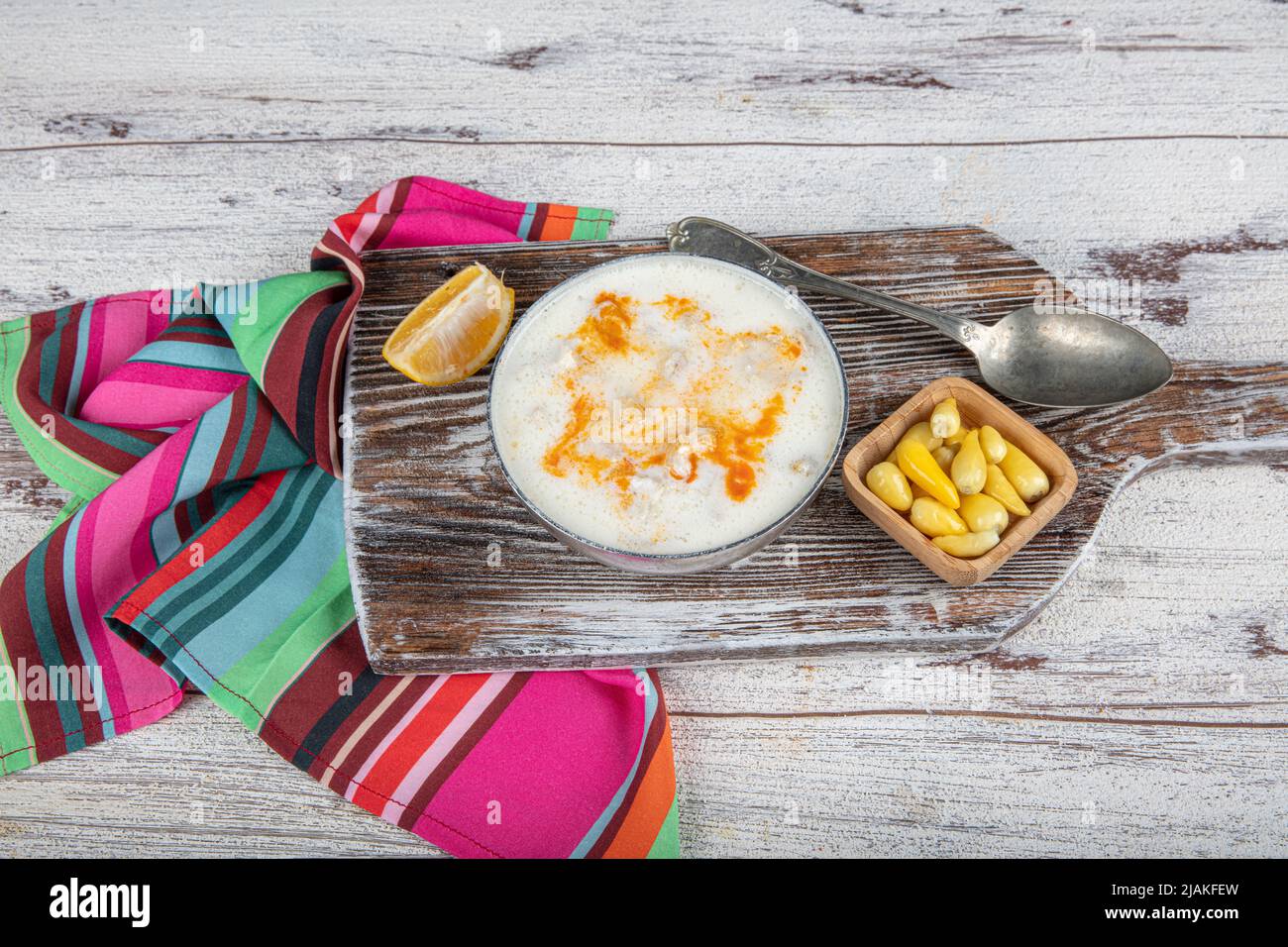 Turkish Paca Turkish Traditional Tripe Soup with bread on white rustic wooden ...