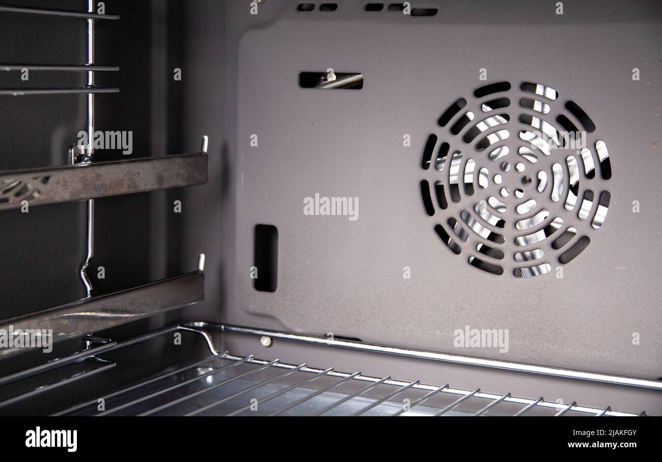 Modern electric oven with telescopic rails, top and bottom heat. Function 3D hot air, thermal grill and convection. Catalytic cleaning system Stock Photo