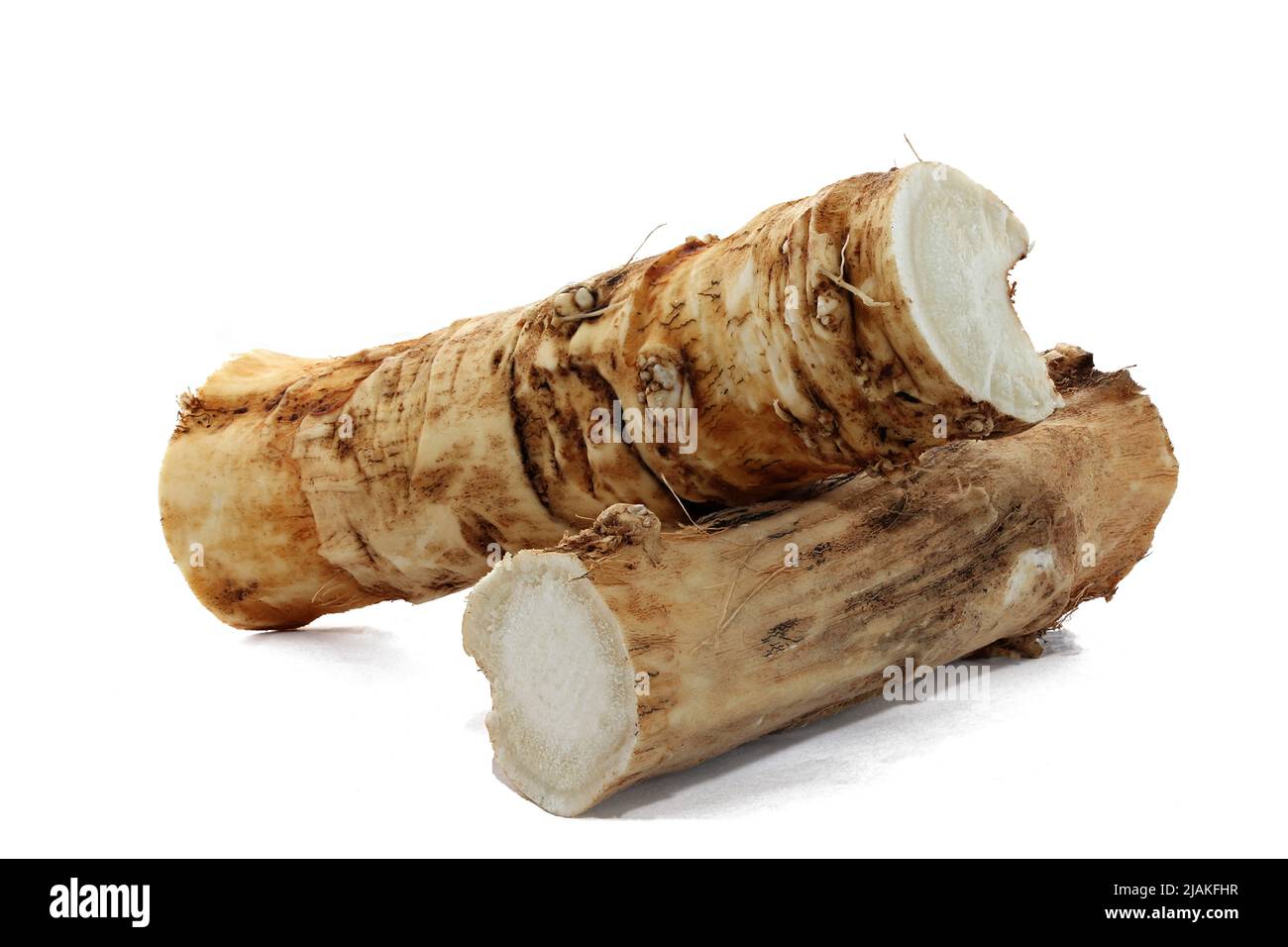 Pieces of horseradish roots isolated on white background Stock Photo