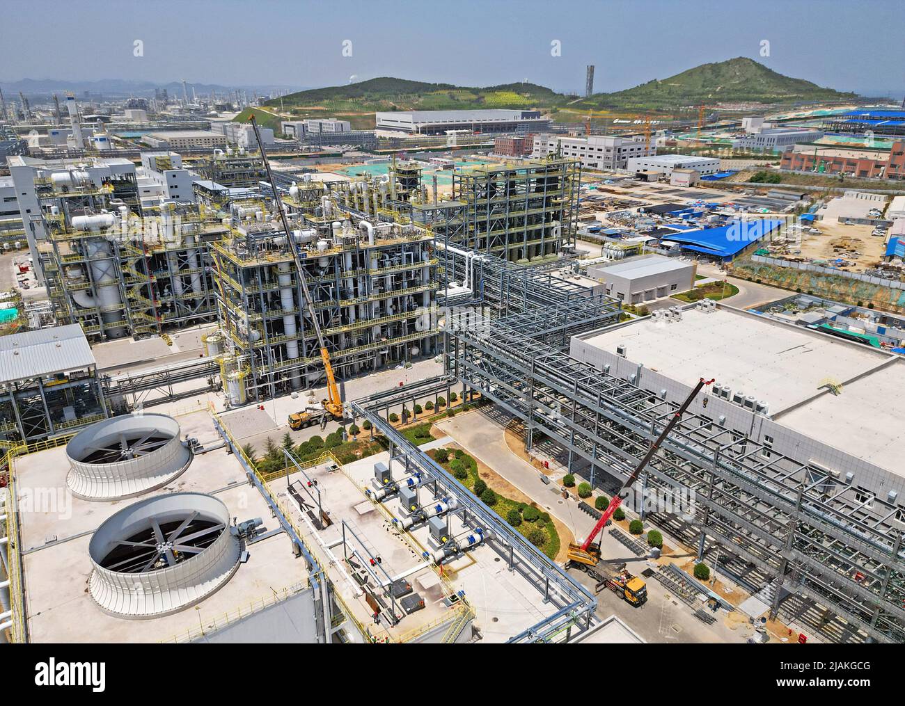 YANTAI, CHINA MAY 31, 2022 Cranes are hoisting chemical equipment