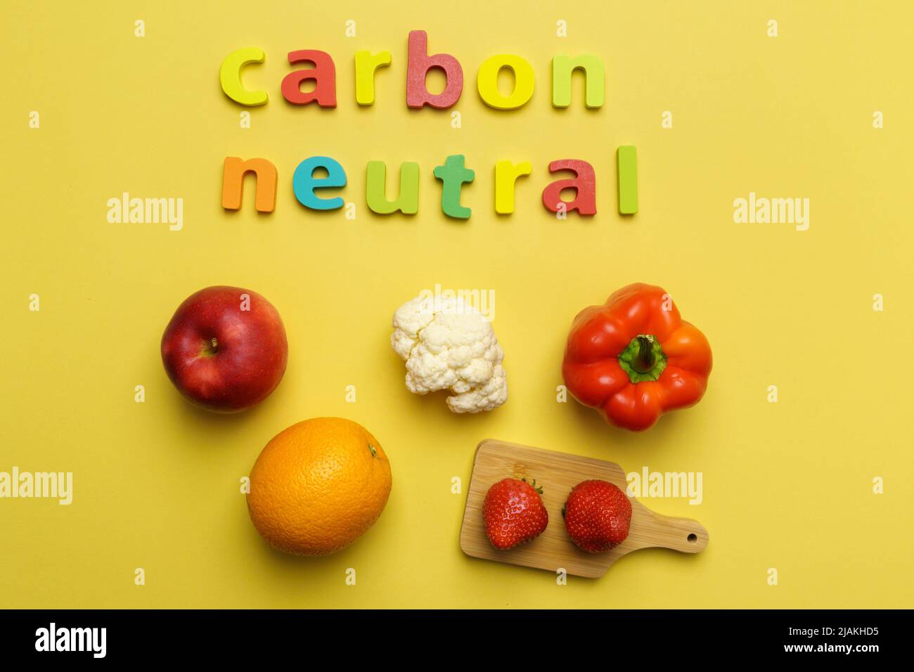 Healthy food natural vegetables in with inscription carbon neutral. Top view Stock Photo