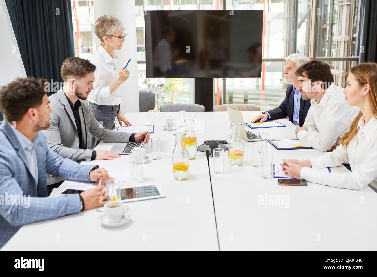 Business people discussing strategy and project in business meeting at ...
