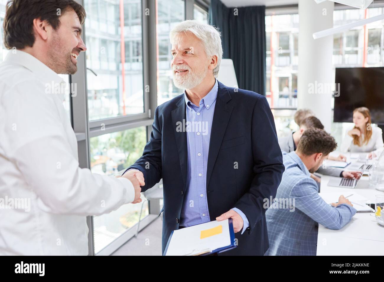 Senior business man and business partner handshake for deal and partnership Stock Photo