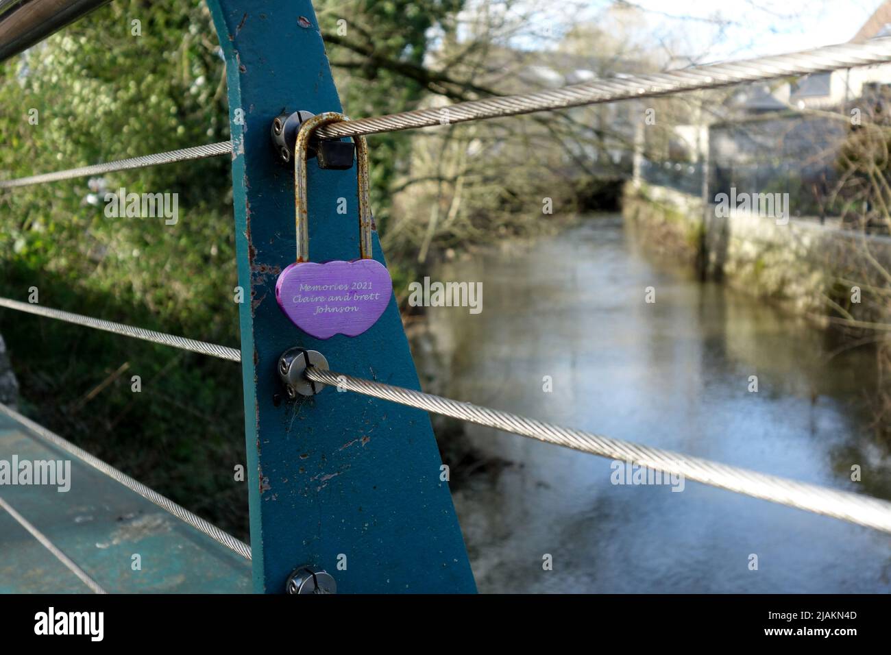 Single love lock on the Weir bridge over the River Wye in Bakewell, Derbyshire. Stock Photo
