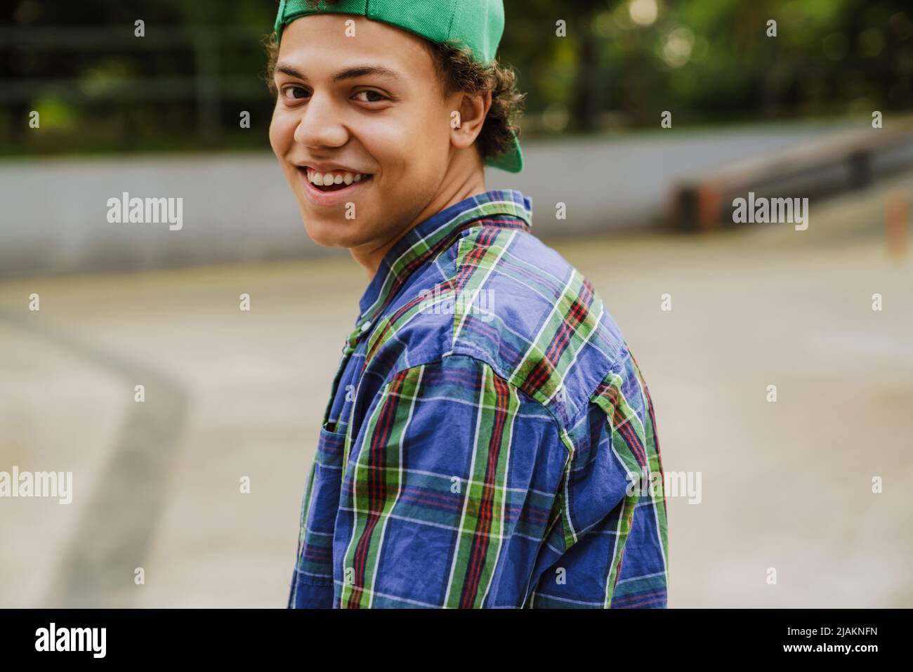 Hispanic teen boy smiling hi-res stock photography and images - Alamy
