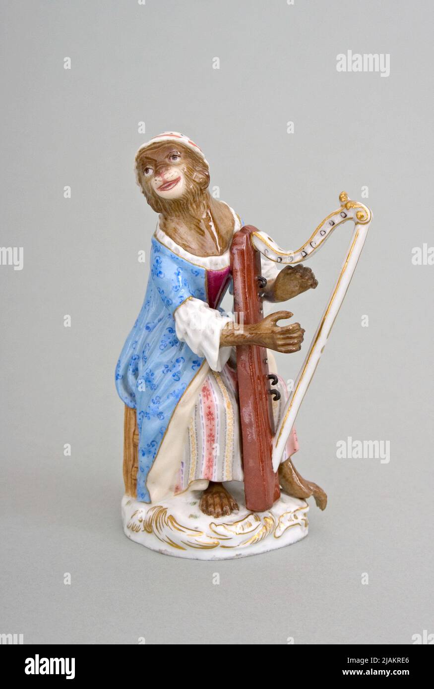 Figure from a monkey band, harpist K trader, Jan Joachim, Miśnia (Meissen) Stock Photo