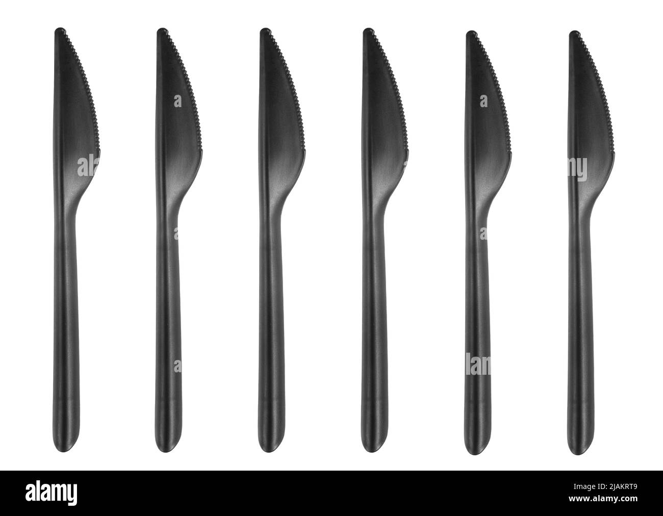 Black plastic knife isolated on white background. Disposable tableware set isolated with clipping path. Stock Photo