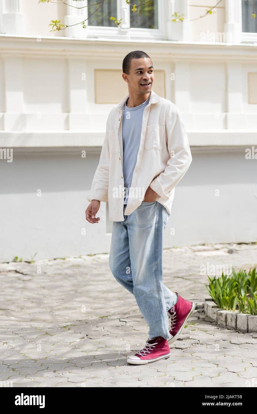 shirt jacket and jeans walking 