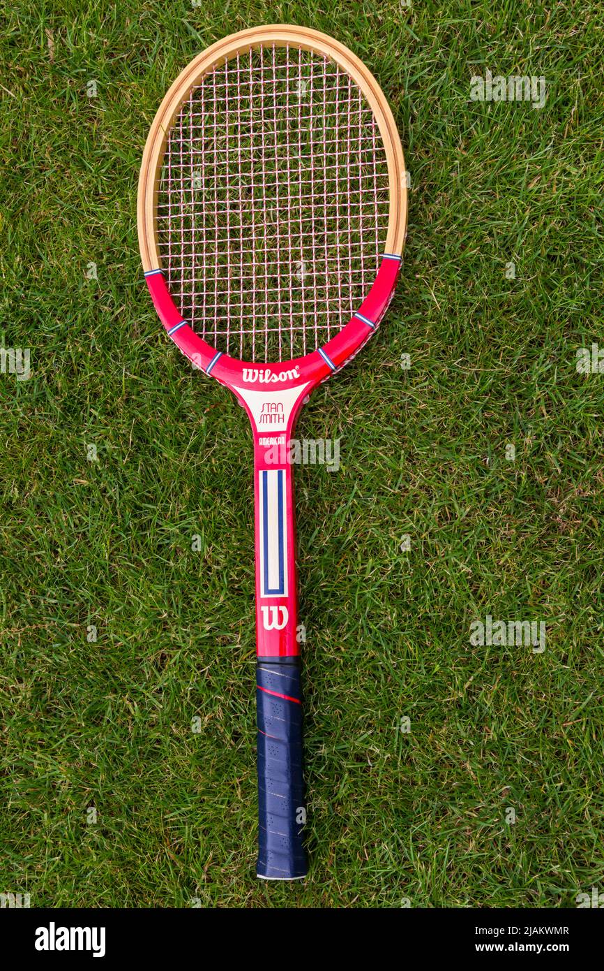 Wilson tennis racket, Wilson tennis racquet, on grass lawn Stock Photo