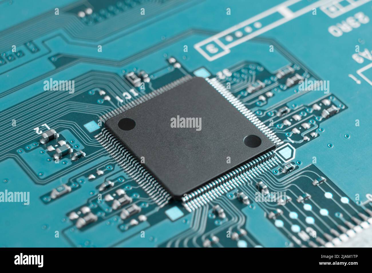Macro shot of Circuit board with resistors microchips and electronic ...