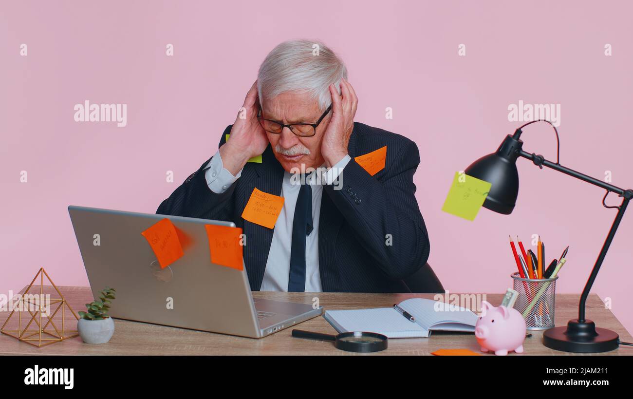 Tired exhausted fatigue senior business man office employee manager