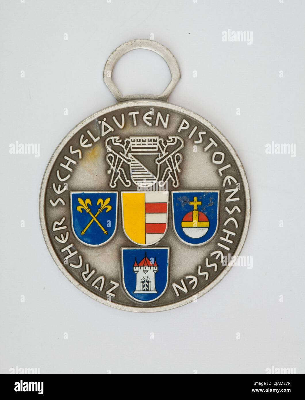 Commemorative badge of the shooting competition from the Zurich pistol on the occasion of the Spring Festival Huguenin Stock Photo