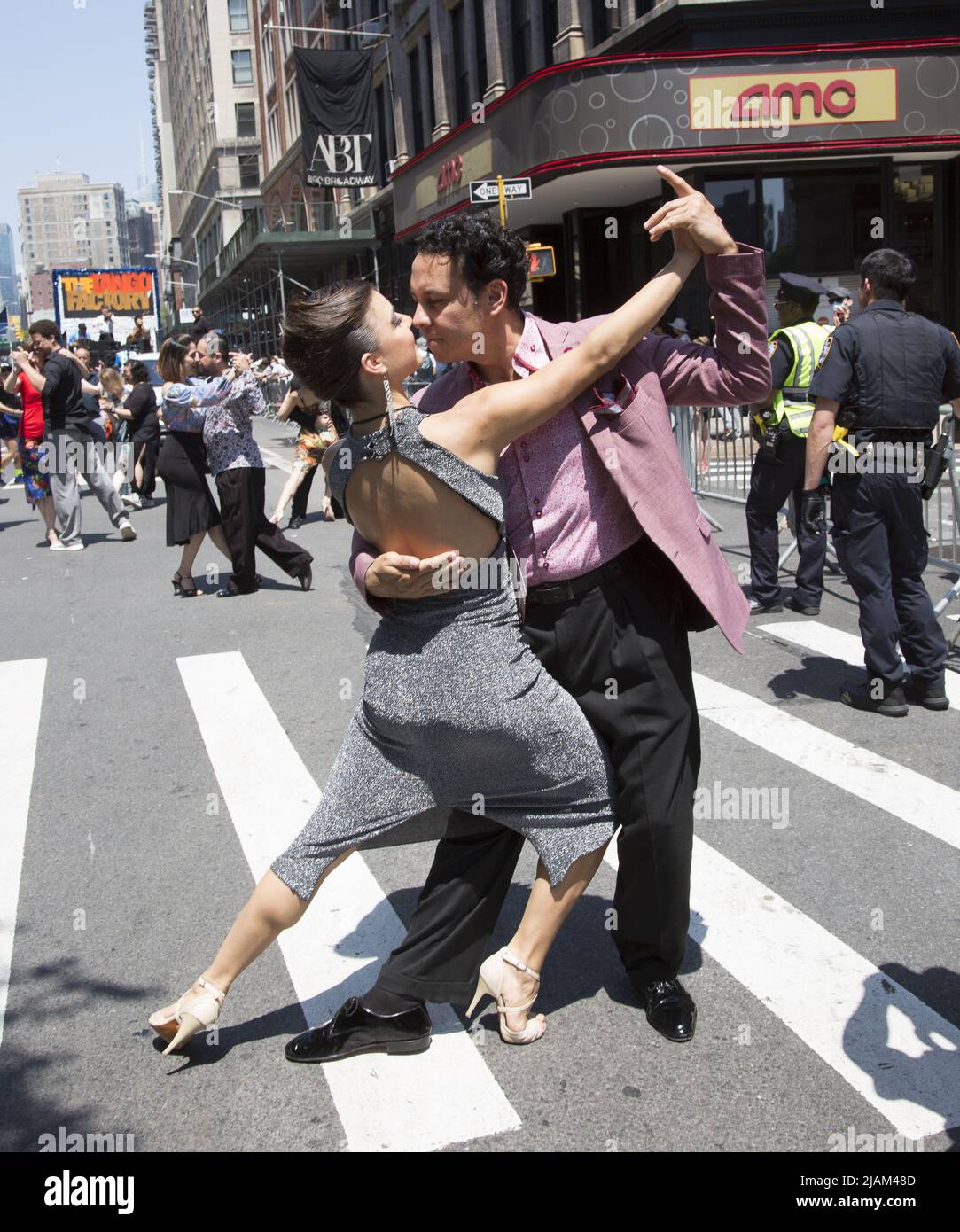 New York City Dance Parade winds its way down Broadway in New York City. Doing the Tango down Broadway. Stock Photo